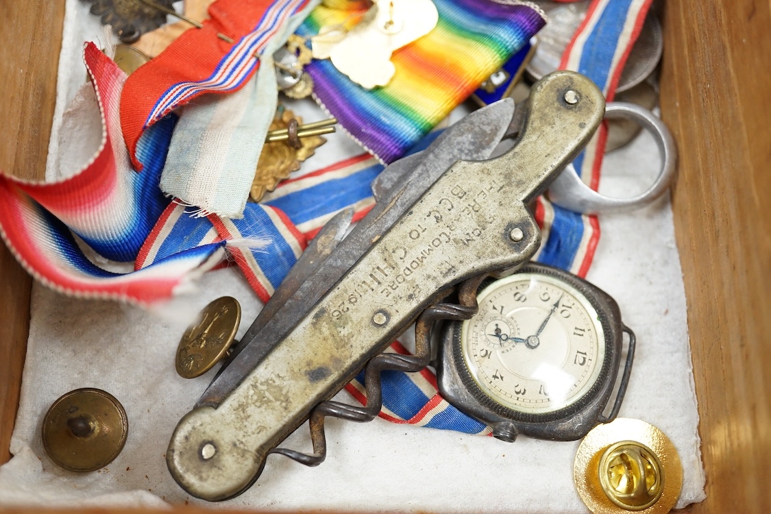 A quantity of assorted medals, an Essex crystal button, badges and ephemera